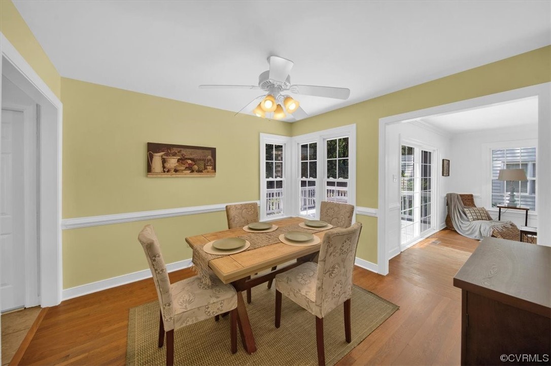 12516 Eagle Ridge Road Henrico, VA 23233 - Photo 17 of 48 Dining space featuring a ceiling fan, hardwood flooring, and natural light