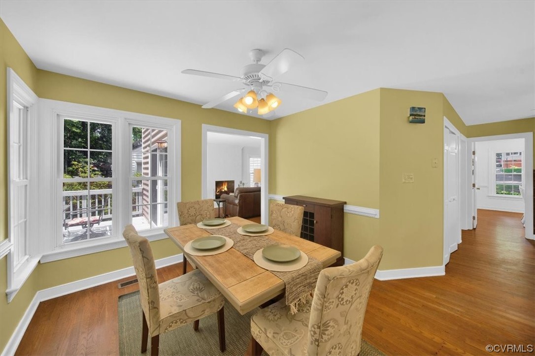 12516 Eagle Ridge Road Henrico, VA 23233 - Photo 19 of 48 Wood floored dining space with a ceiling fan and natural light