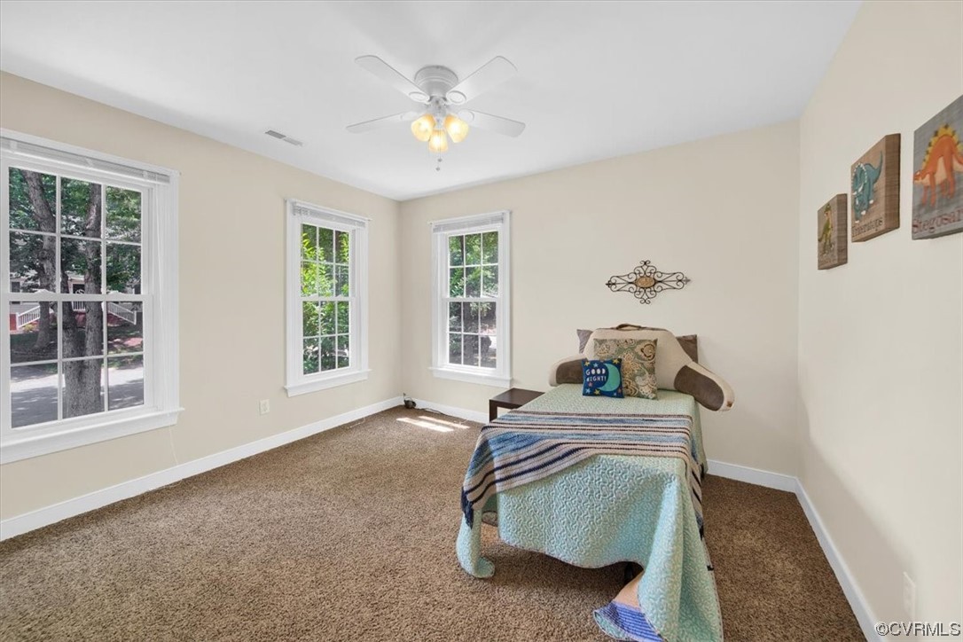 12516 Eagle Ridge Road Henrico, VA 23233 - Photo 36 of 48 Bedroom featuring a ceiling fan, carpet, and natural light
