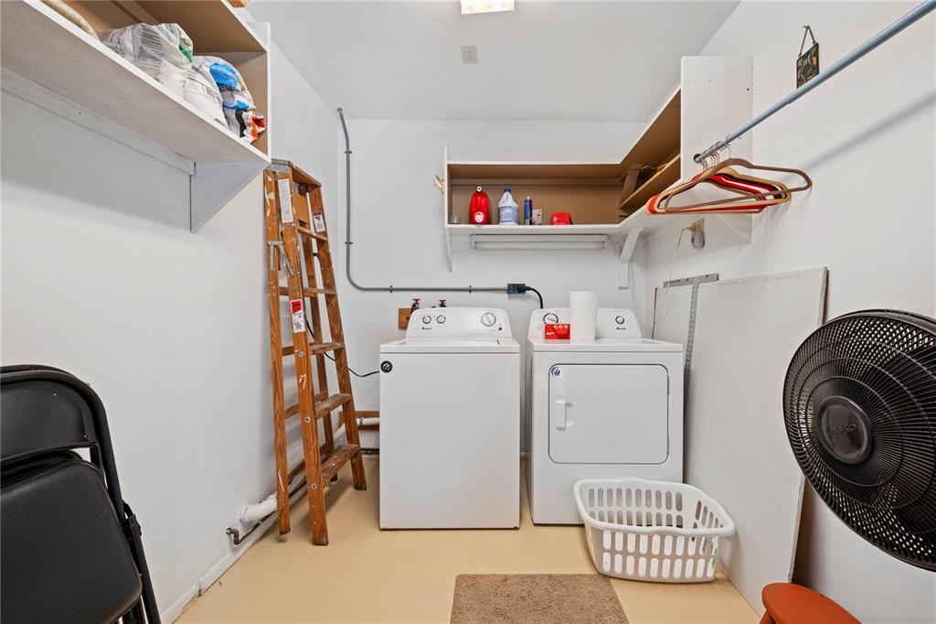 7360 Ulmerton Road, Unit 15D Largo, FL 33771 - Photo 43 of 75 a utility room with dryer and washer