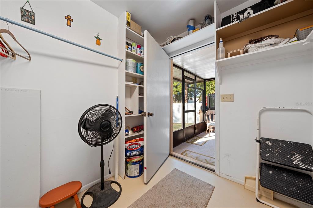 7360 Ulmerton Road, Unit 15D Largo, FL 33771 - Photo 44 of 75 a view of storage and utility room with washer and dryer