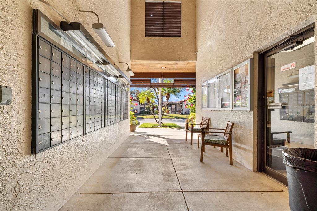 7360 Ulmerton Road, Unit 15D Largo, FL 33771 - Photo 52 of 75 a view of a balcony with outdoor seating