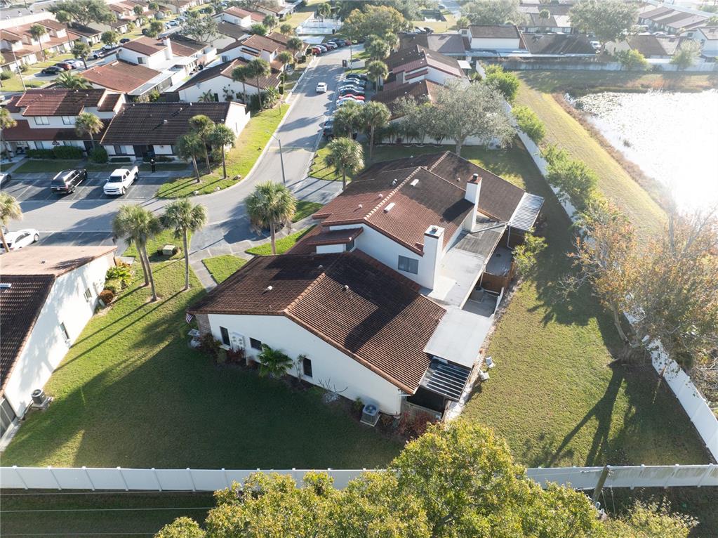 7360 Ulmerton Road, Unit 15D Largo, FL 33771 - Photo 56 of 75 an aerial view of residential houses with outdoor space