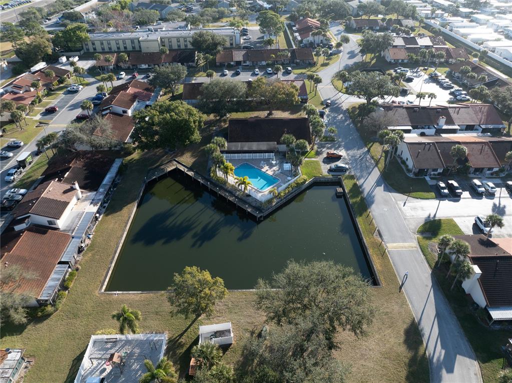 7360 Ulmerton Road, Unit 15D Largo, FL 33771 - Photo 63 of 75 an aerial view of a house with a lake view
