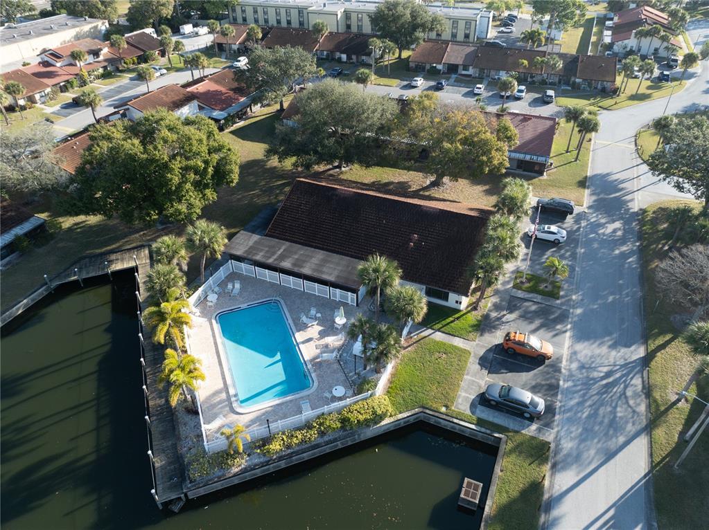 7360 Ulmerton Road, Unit 15D Largo, FL 33771 - Photo 65 of 75 an aerial view of residential houses with outdoor space