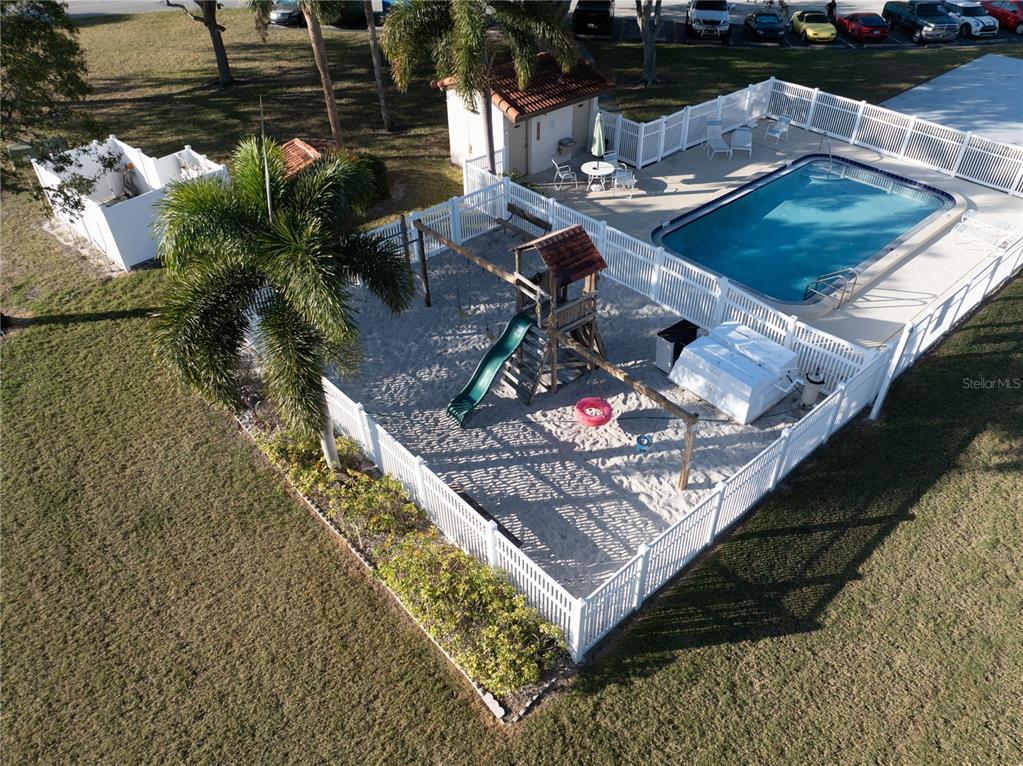 7360 Ulmerton Road, Unit 15D Largo, FL 33771 - Photo 69 of 75 a view of a couches and table in the patio