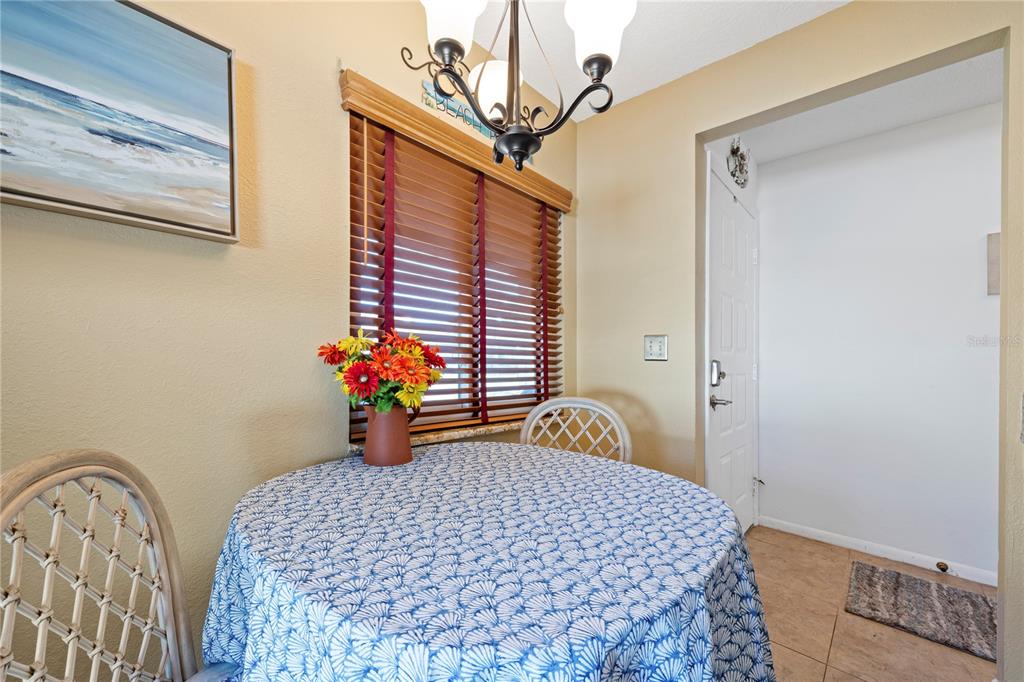 7360 Ulmerton Road, Unit 15D Largo, FL 33771 - Photo 9 of 75 a bedroom with a bed and a window