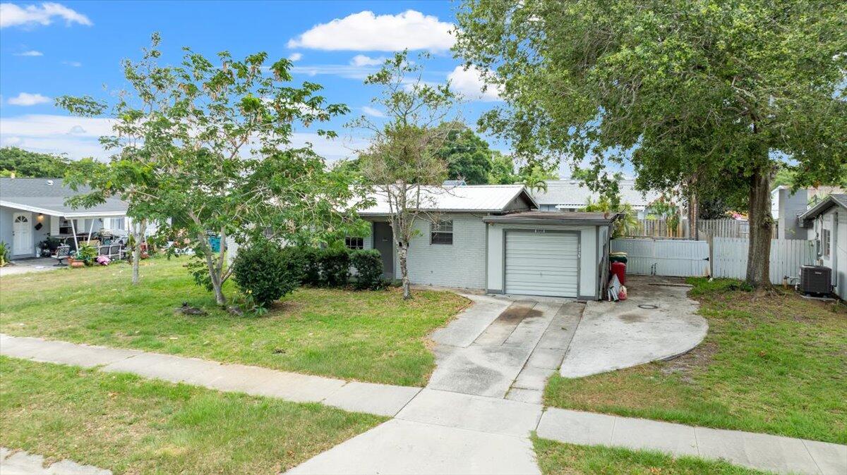 3308 Purdue Street Melbourne, FL 32901 - Photo 1 of 43 a view of a house with a yard and tree s
