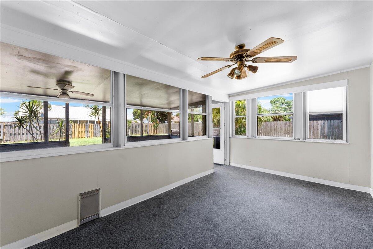 3308 Purdue Street Melbourne, FL 32901 - Photo 21 of 43 a view of an empty room with a window