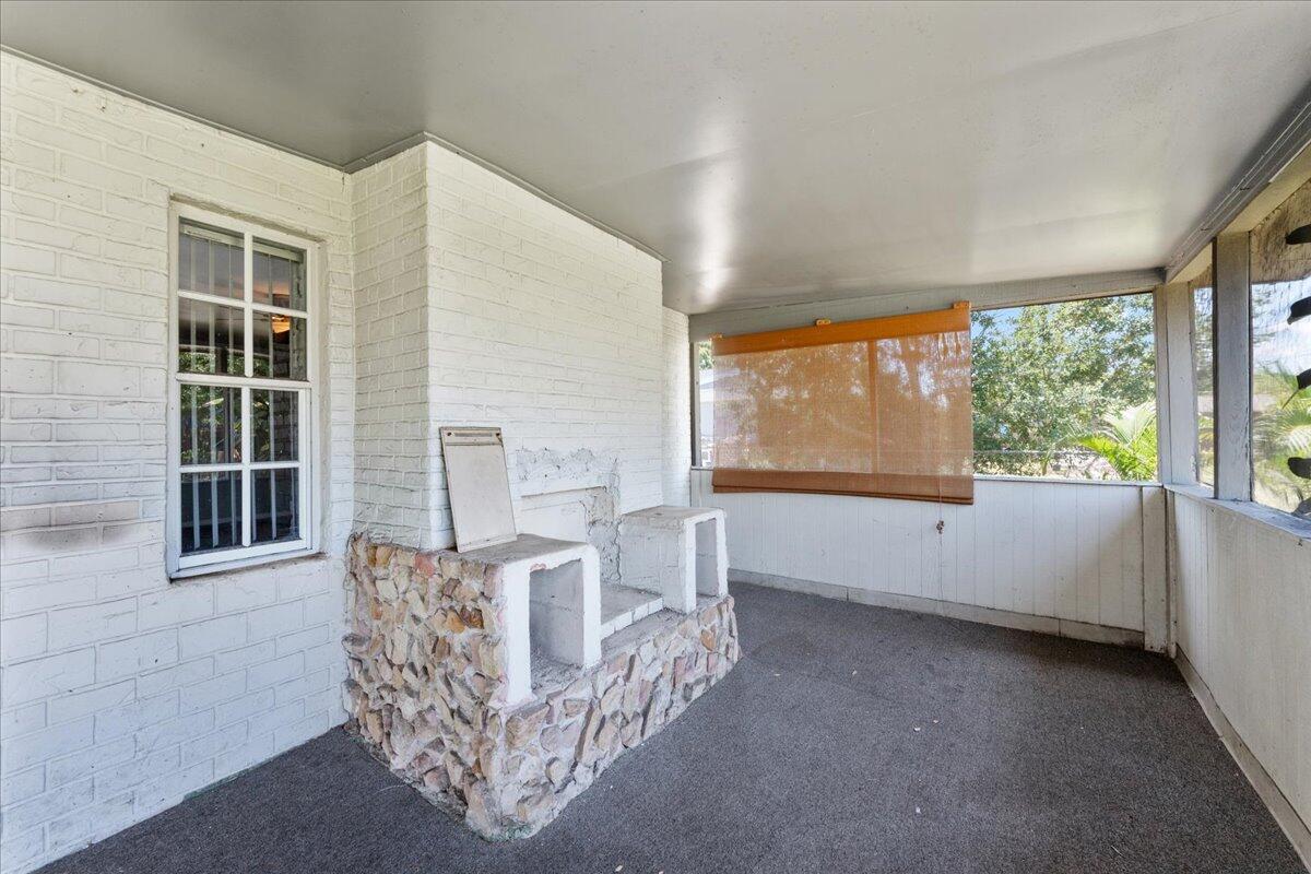 3308 Purdue Street Melbourne, FL 32901 - Photo 25 of 43 wooden floor in an empty room with a window