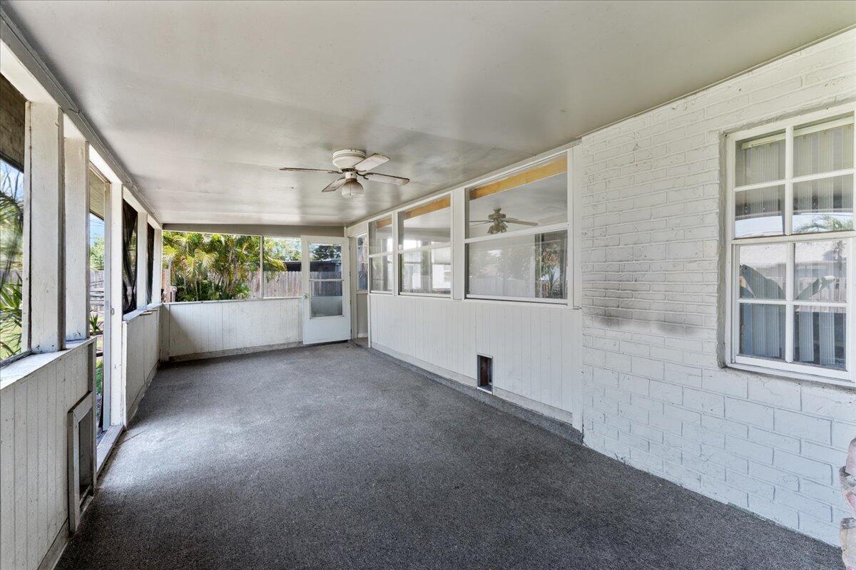 3308 Purdue Street Melbourne, FL 32901 - Photo 26 of 43 a view of a big room with windows