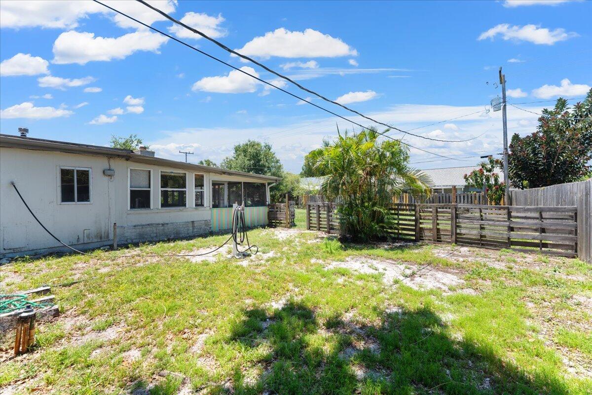 3308 Purdue Street Melbourne, FL 32901 - Photo 30 of 43 a view of a house with backyard