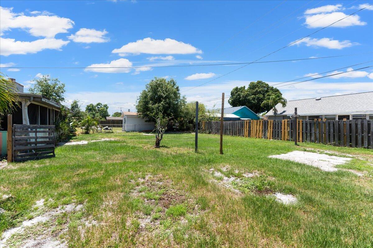 3308 Purdue Street Melbourne, FL 32901 - Photo 31 of 43 a view of a backyard with a garden
