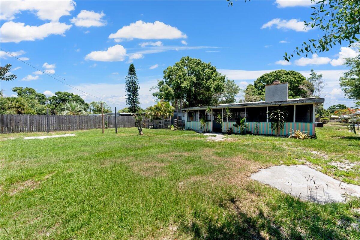 3308 Purdue Street Melbourne, FL 32901 - Photo 33 of 43 a view of a house with a backyard