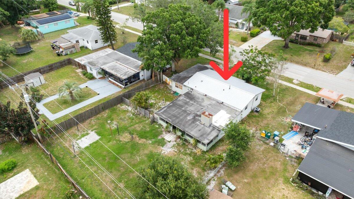 3308 Purdue Street Melbourne, FL 32901 - Photo 36 of 43 an aerial view of residential houses with outdoor space and street view