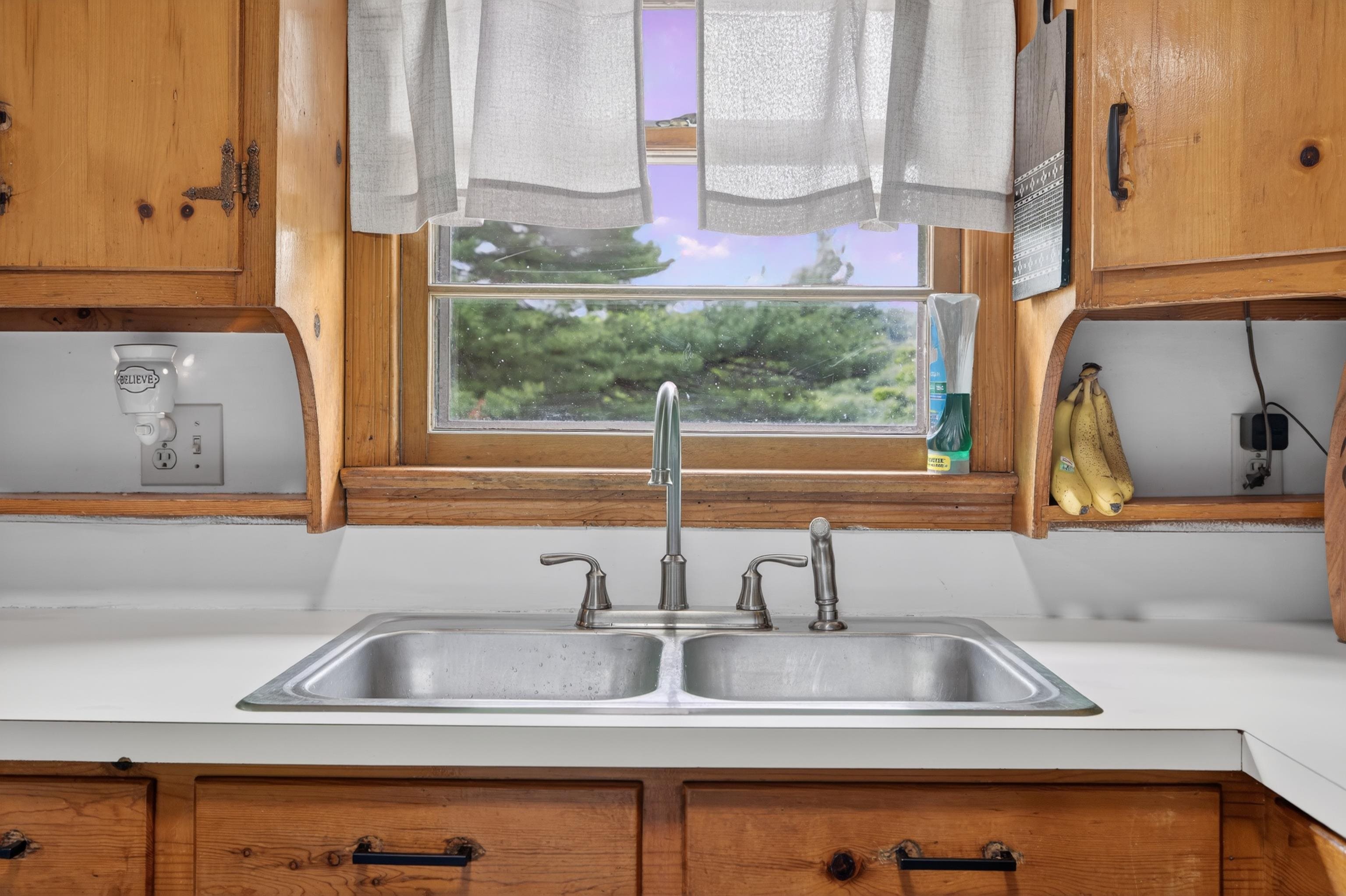 7827 Lee Highway Raphine, VA 24472 - Photo 21 of 62 a kitchen sink with a granite countertop window and sink
