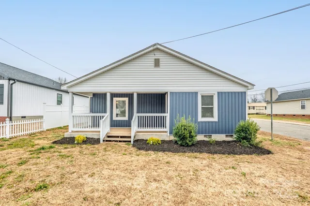 a backyard of a house with seating space