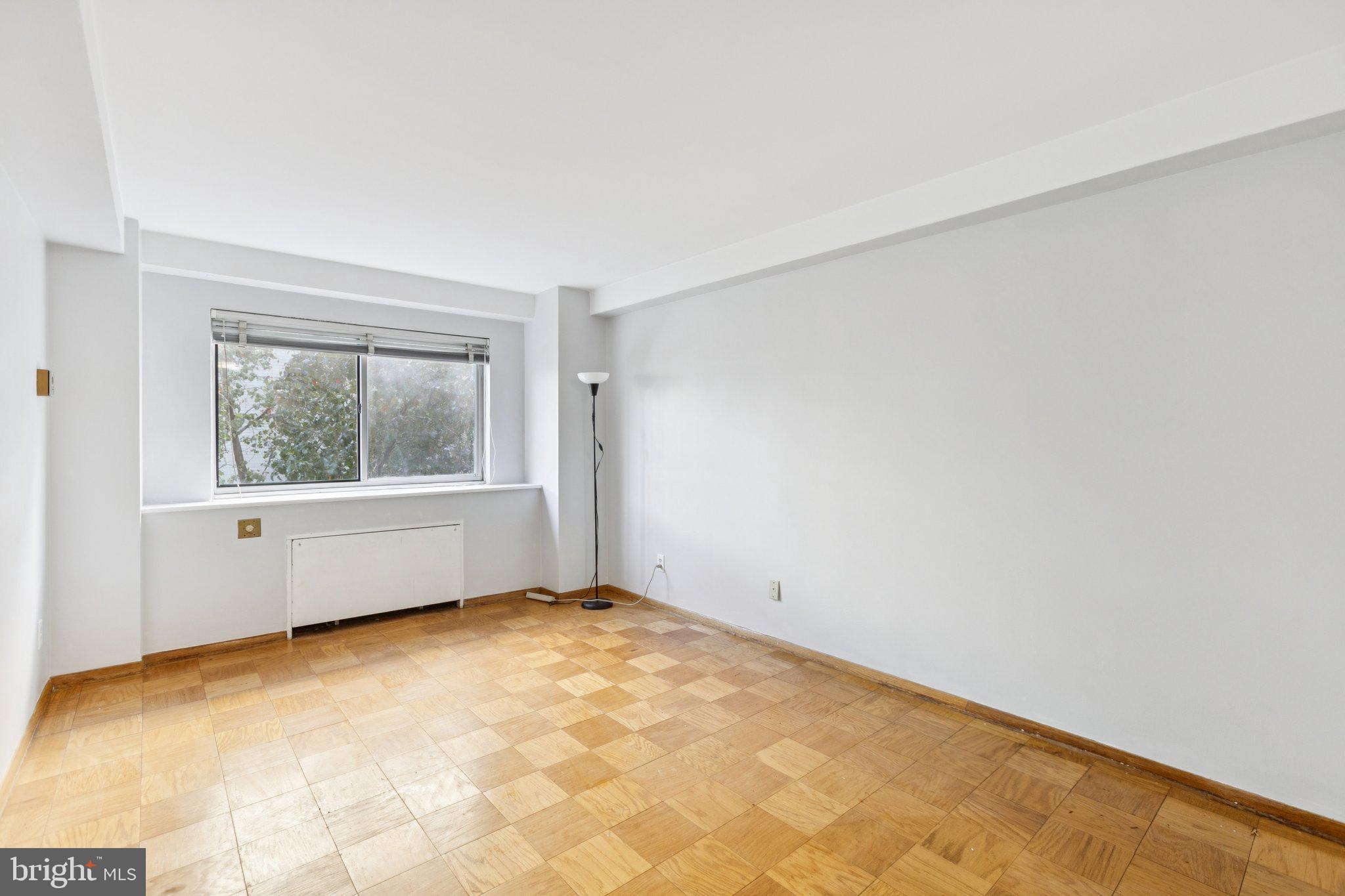 730 24th Street Northwest, Unit 321 Washington, DC 20037 - Photo 12 of 20 an empty room with a window