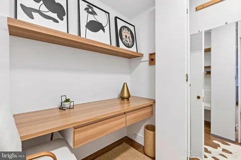 a view of a hallway with closet