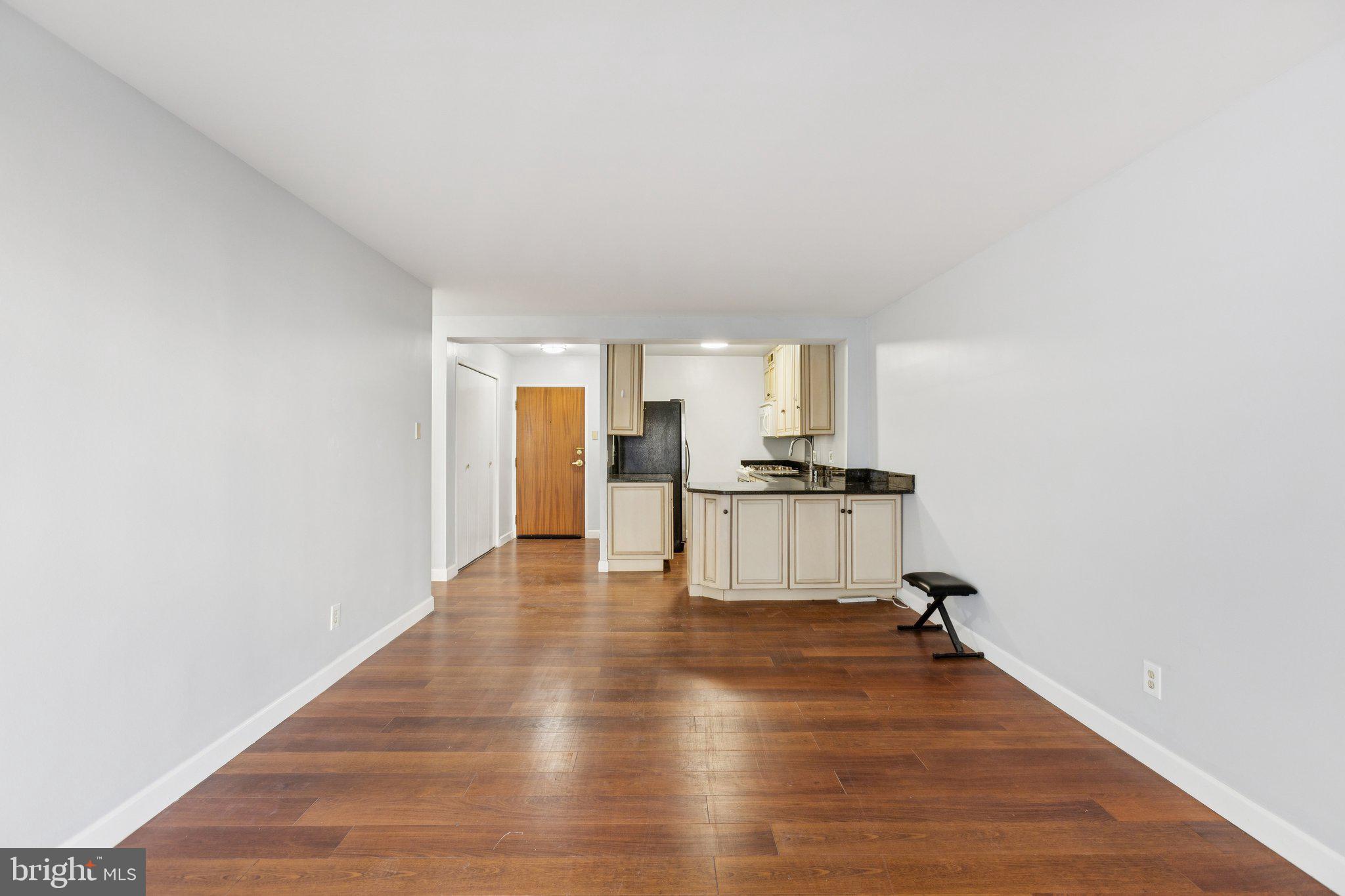 730 24th Street Northwest, Unit 321 Washington, DC 20037 - Photo 14 of 29 a view of kitchen and wooden floor