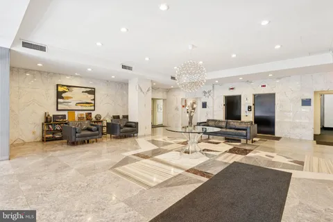 a view of a living room and dining room