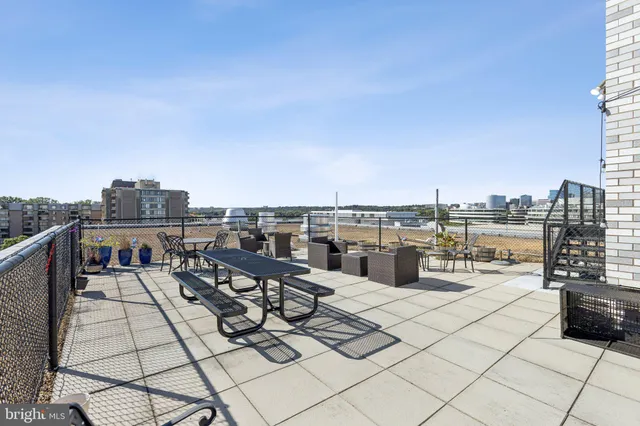 a view of a terrace with city view