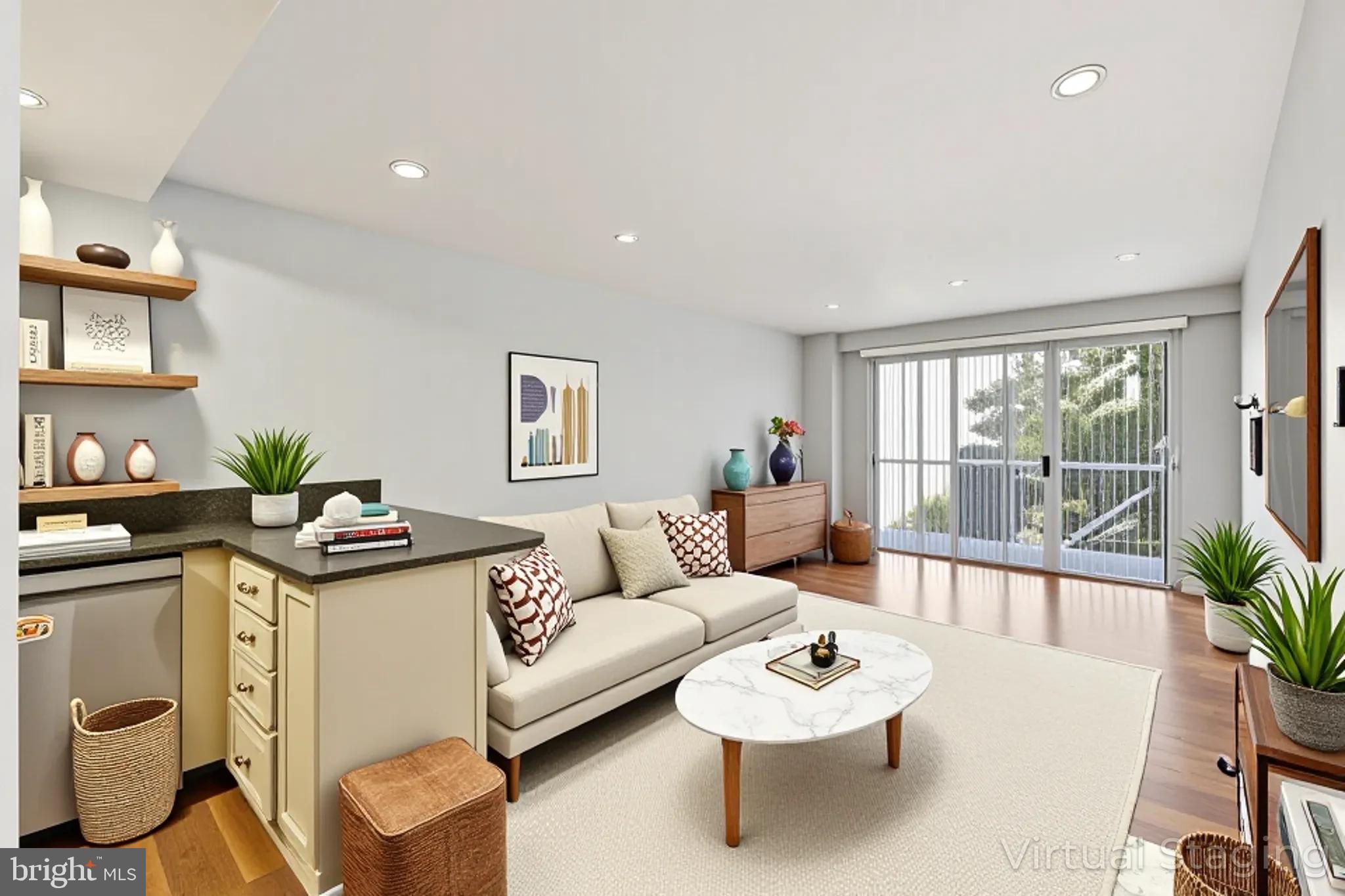 730 24th Street Northwest, Unit 321 Washington, DC 20037 - Photo 6 of 29 a living room with furniture and a large window