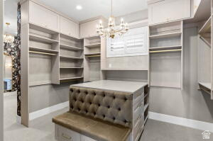 1141 East Lost Ridge Drive Washington, UT 84780 - Photo 69 of 108 Custom closet system featuring extensive shelving, hanging rods, and built-in cabinetry