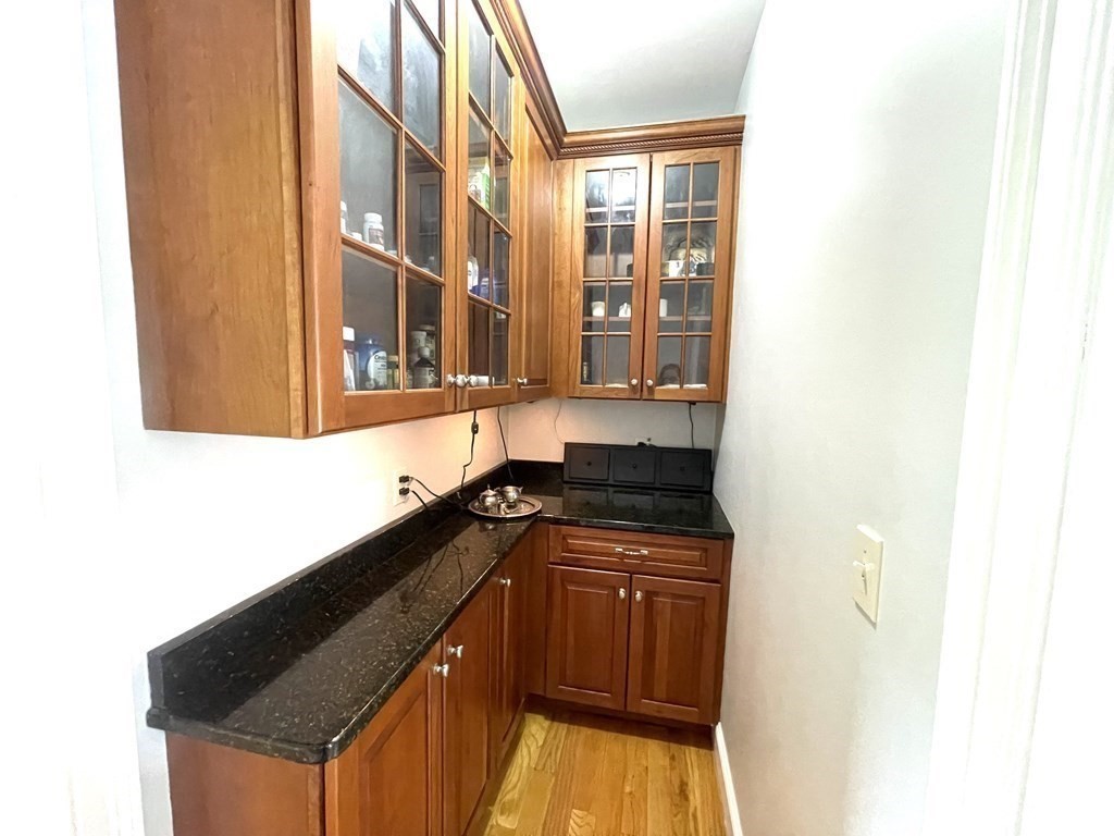 148 Hillcrest Road Marshfield, MA 02050 - Photo 13 of 42 a kitchen with granite countertop a sink and a stove