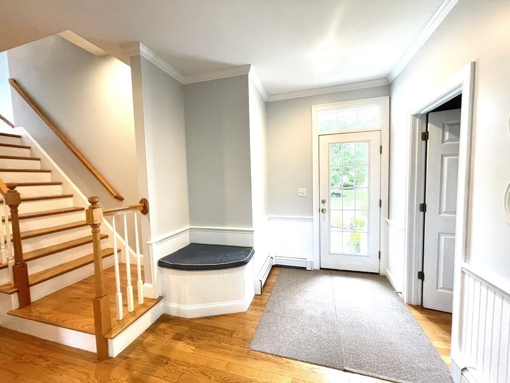 148 Hillcrest Road Marshfield, MA 02050 - Photo 18 of 42 a view of entryway and hall with wooden floor