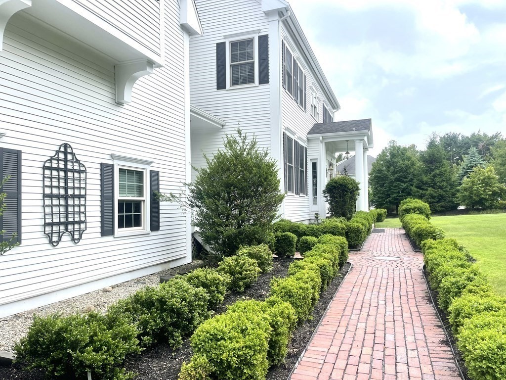148 Hillcrest Road Marshfield, MA 02050 - Photo 2 of 42 a front view of a house with garden