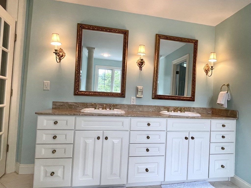 148 Hillcrest Road Marshfield, MA 02050 - Photo 23 of 42 a bathroom with a sink and a mirror