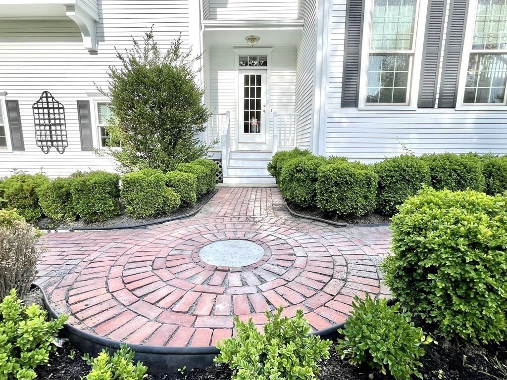 148 Hillcrest Road Marshfield, MA 02050 - Photo 3 of 42 a view of a backyard with plants and porch