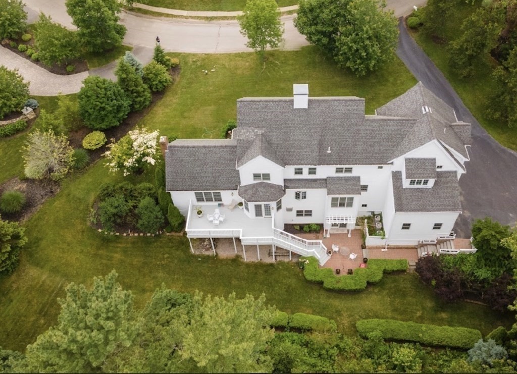 148 Hillcrest Road Marshfield, MA 02050 - Photo 39 of 42 an aerial view of a house with a garden and lake view