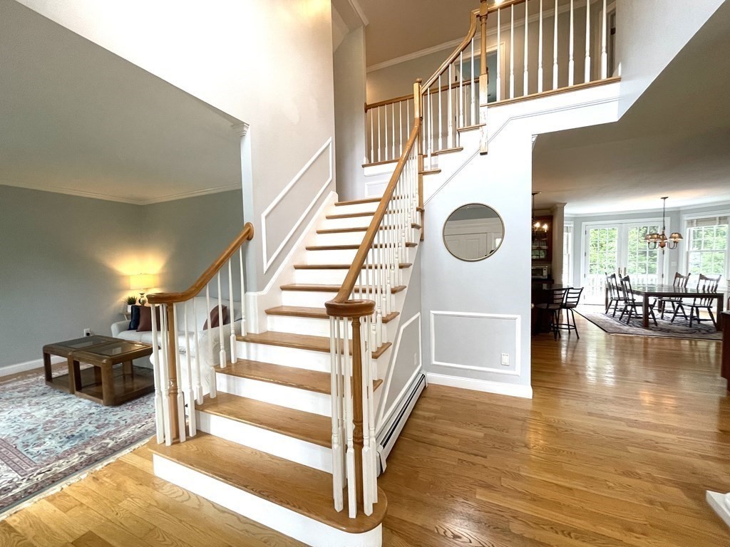 148 Hillcrest Road Marshfield, MA 02050 - Photo 5 of 42 a view of entryway and hall with wooden floor