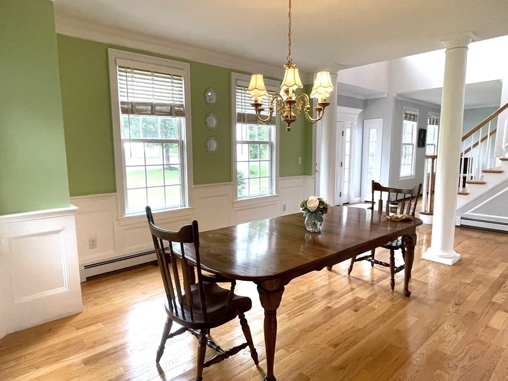 148 Hillcrest Road Marshfield, MA 02050 - Photo 6 of 42 a view of a dining room with furniture window and wooden floor