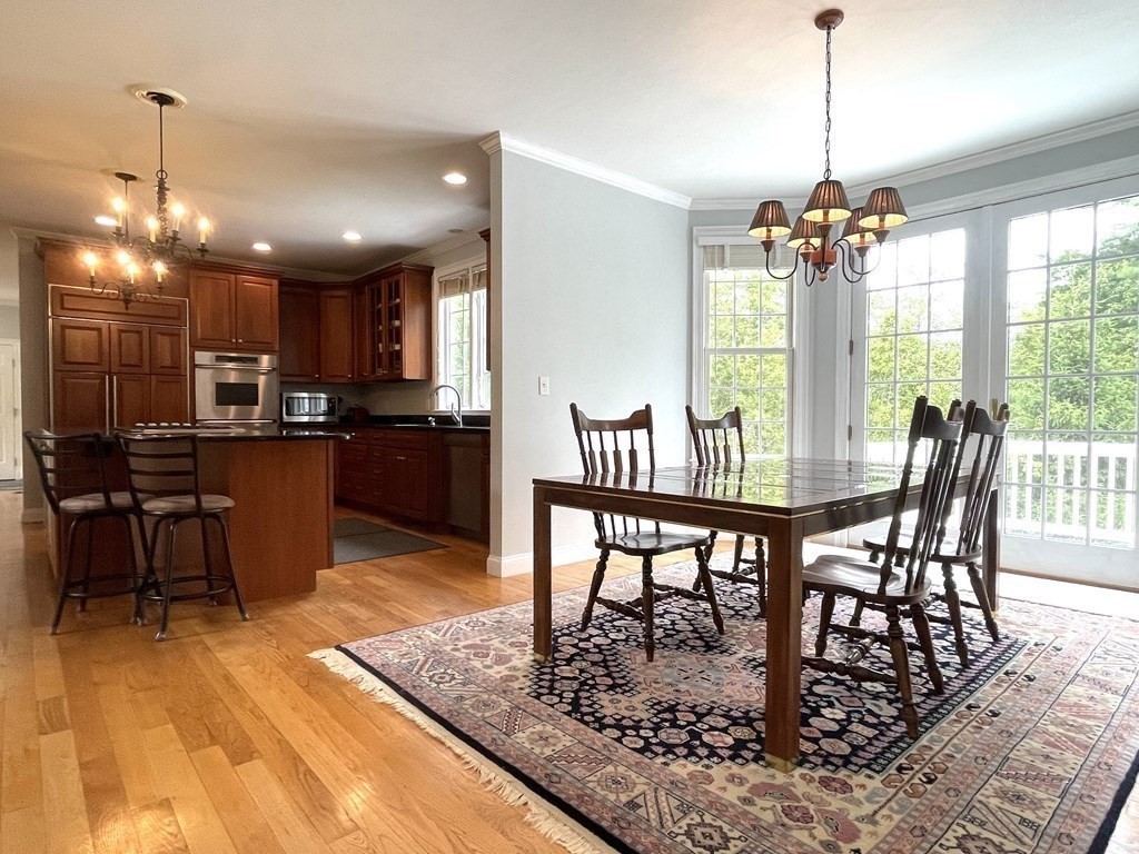 148 Hillcrest Road Marshfield, MA 02050 - Photo 10 of 42 a view of a dining room with furniture window and outside view