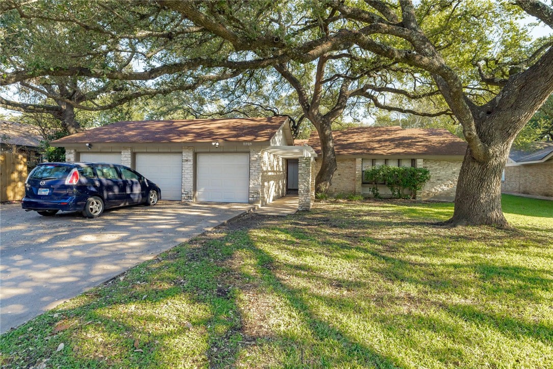 11909 Charing Cross Road Austin, TX 78759 - Photo 1 of 1 Pulling up to the property, you notice the impressive tree canopy, making it easy to see how Barrington Oaks got its name.