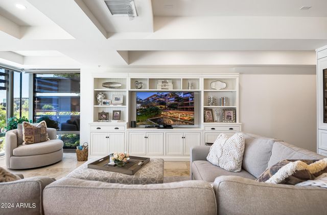 a living room with furniture and a couch