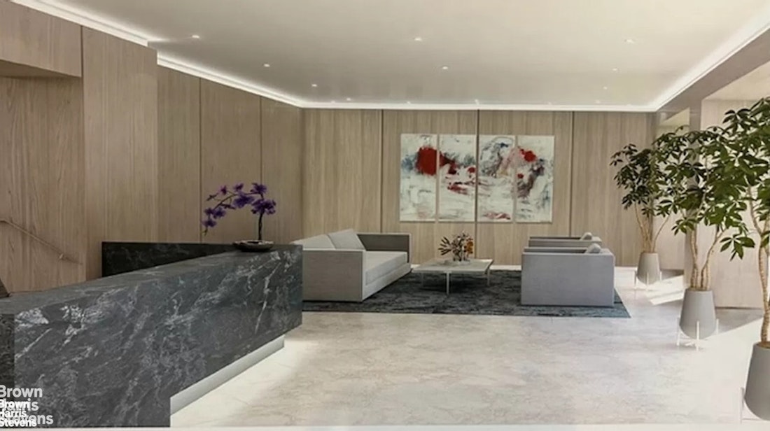 305 East 40th Street, Unit 4F Manhattan, NY 10016 - Photo 6 of 9 a living room with furniture and flowers