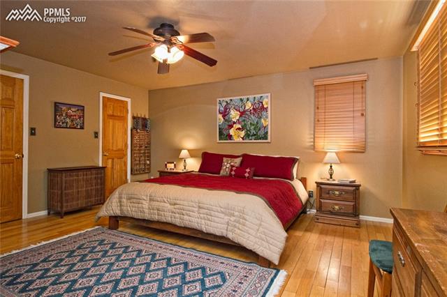 1129 Cresta Road Colorado Springs, CO 80905 - Photo 15 of 35 Master bedroom with 2 closets! A 3rd closet is also available.