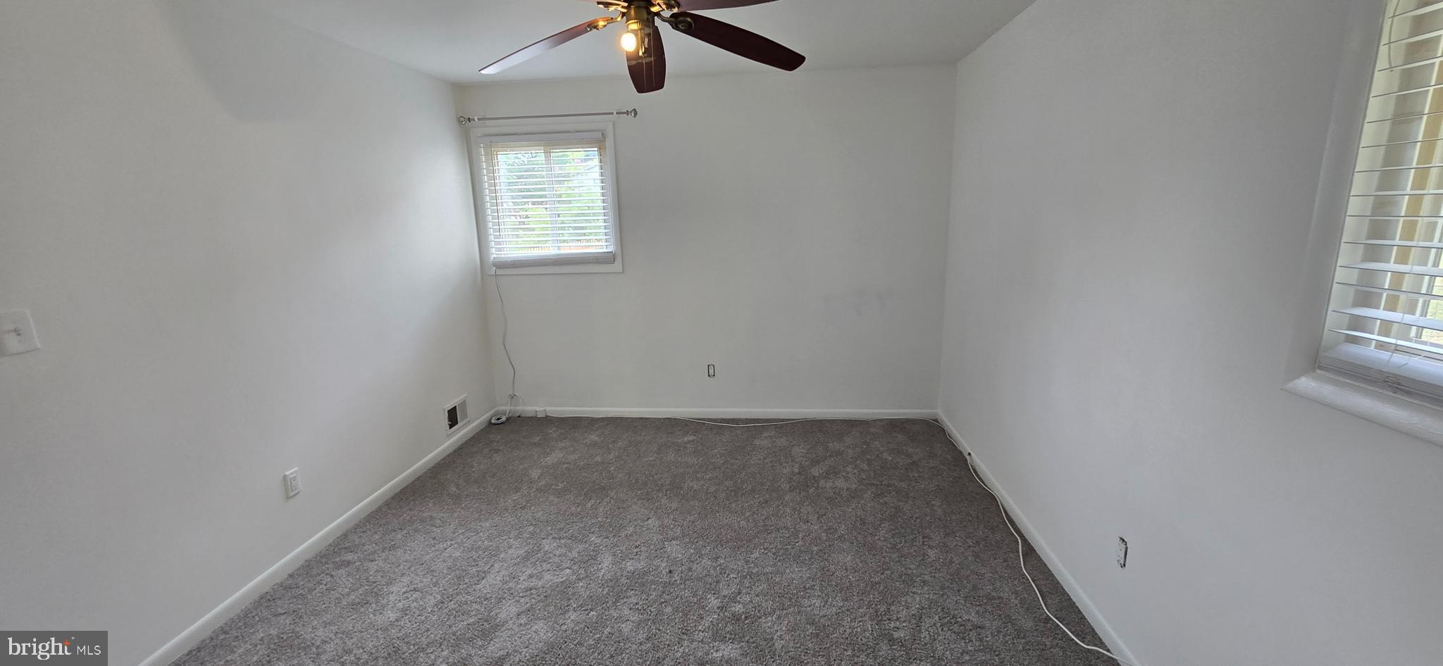 1700 Jarvis Avenue Oxon Hill, MD 20745 - Photo 11 of 15 an empty room with windows
