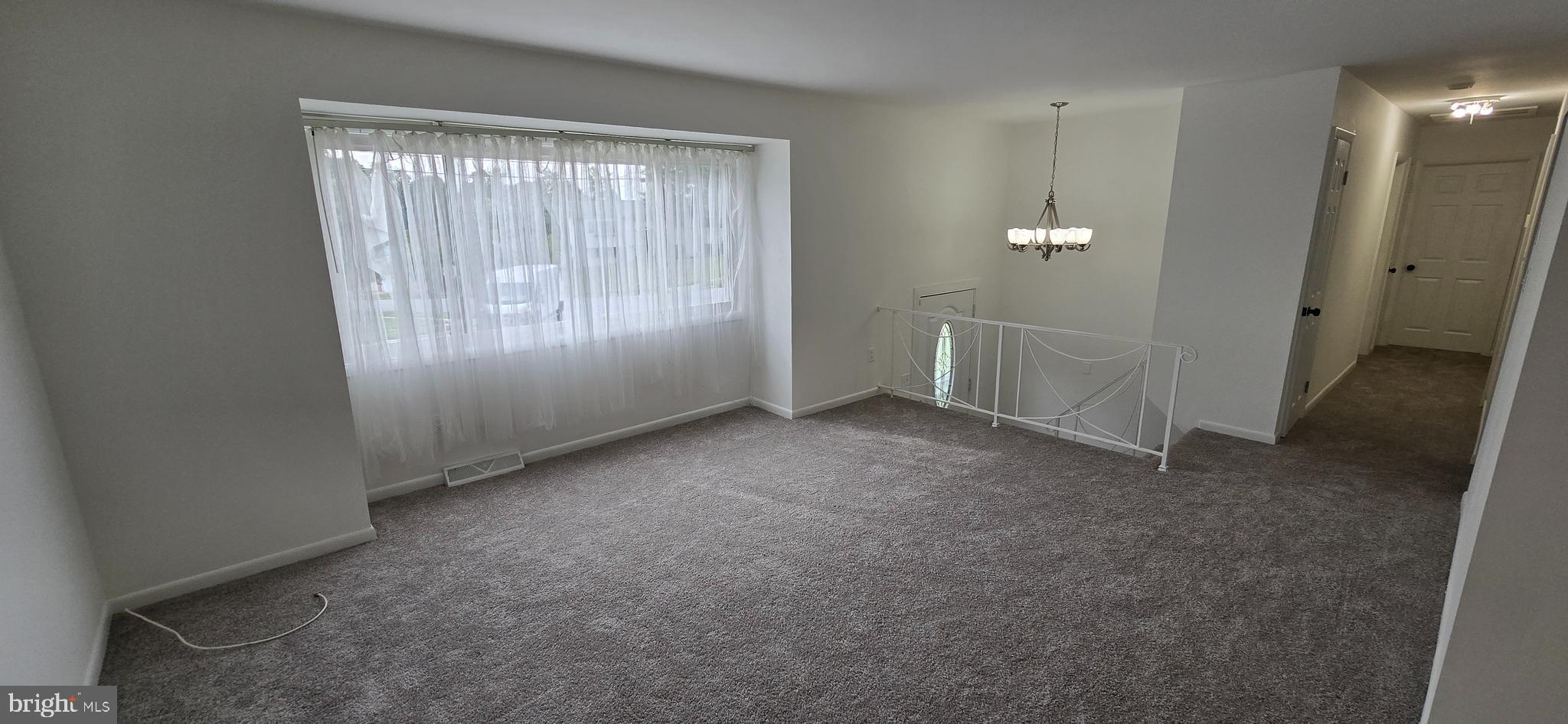 1700 Jarvis Avenue Oxon Hill, MD 20745 - Photo 2 of 15 an empty room with windows