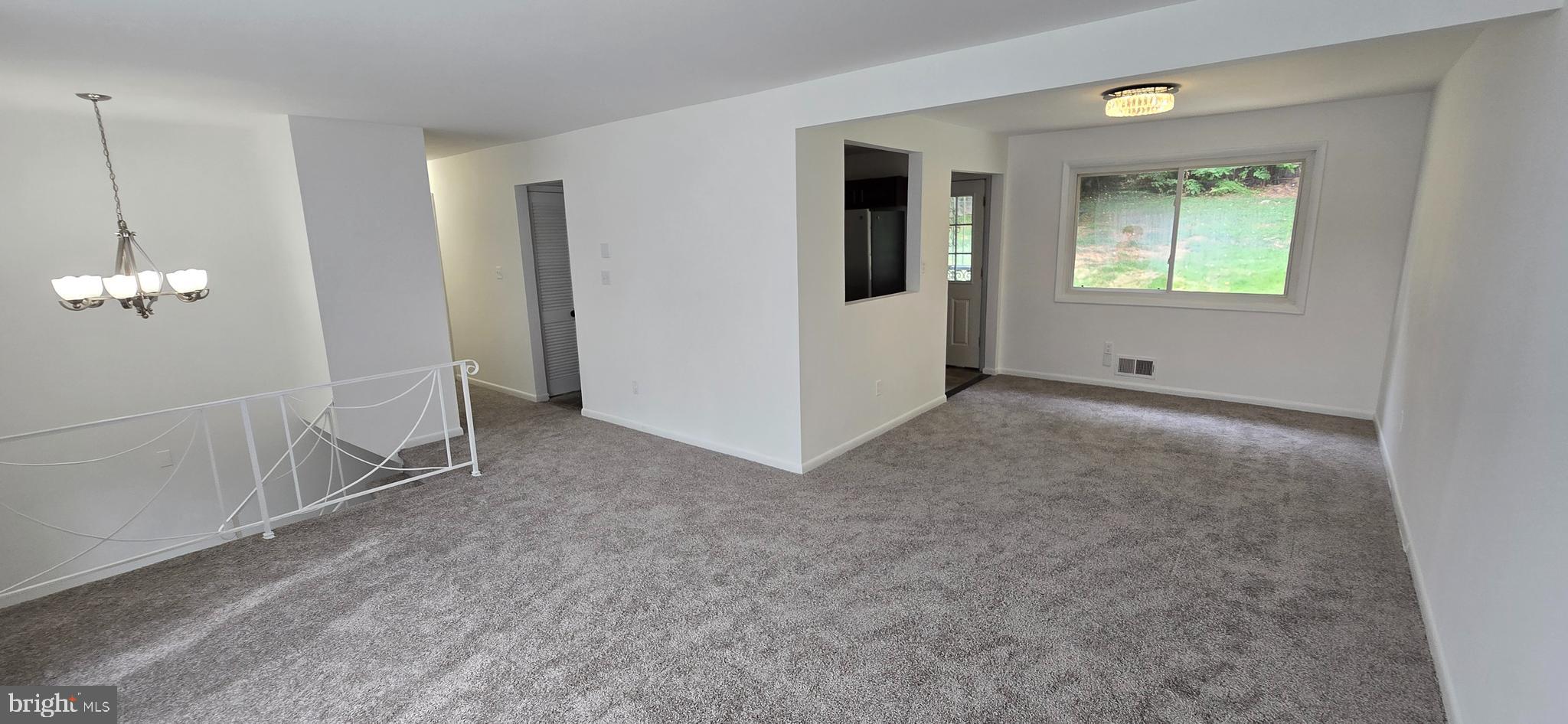 1700 Jarvis Avenue Oxon Hill, MD 20745 - Photo 3 of 15 a view of empty room with window