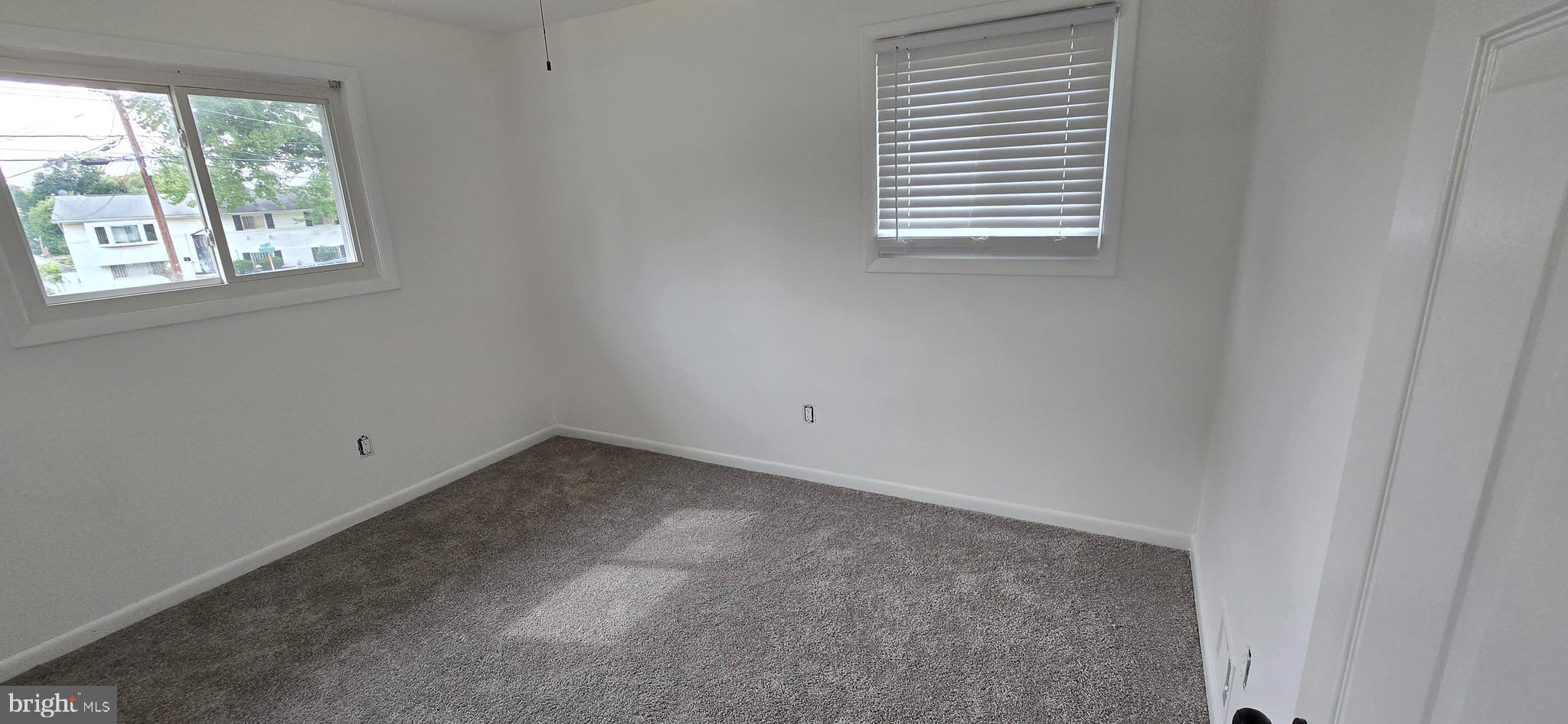 1700 Jarvis Avenue Oxon Hill, MD 20745 - Photo 9 of 15 an empty room with a window
