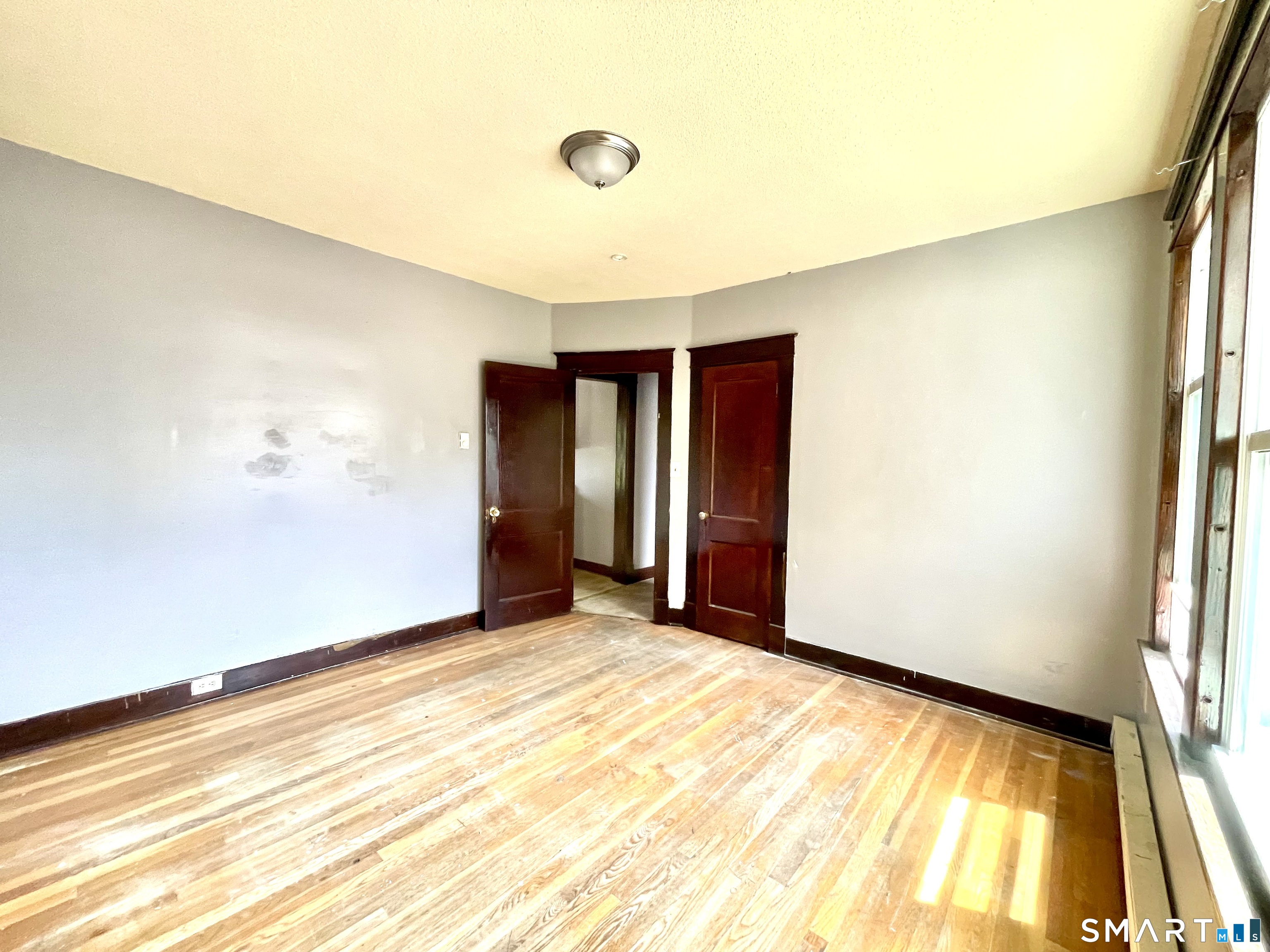 146 Charles Street, Unit 3 Waterbury, CT 06708 - Photo 19 of 20 a view of an empty room