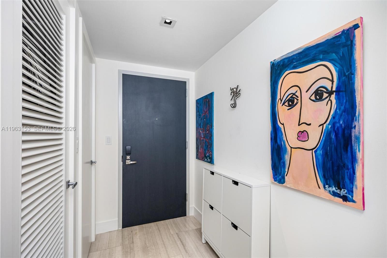 1451 Brickell Avenue, Unit 2204 Miami, FL 33131 - Photo 17 of 29 a sign board with a hallway