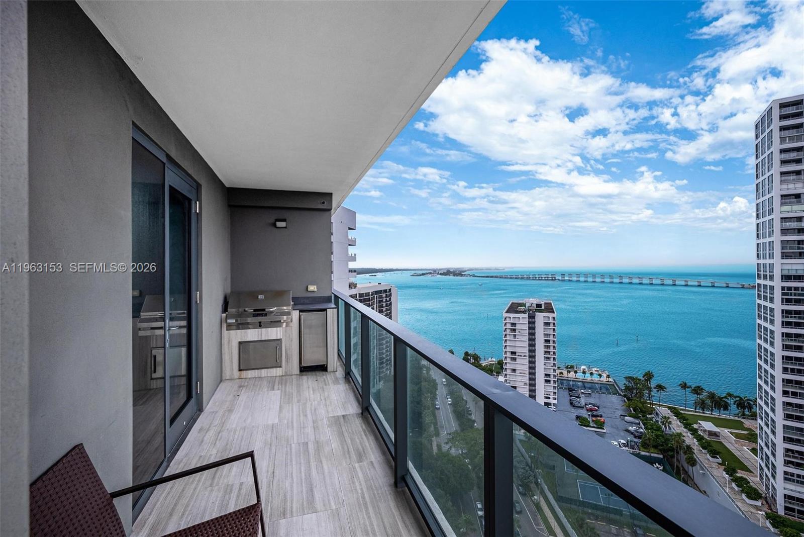 1451 Brickell Avenue, Unit 2204 Miami, FL 33131 - Photo 18 of 29 a view of a balcony next to a lake view