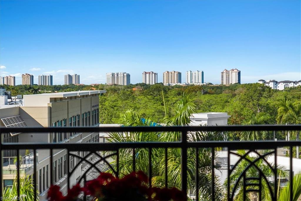 9115 Strada Place, Unit 5512 Naples, FL 34108 - Photo 26 of 42 a view of a street from a balcony