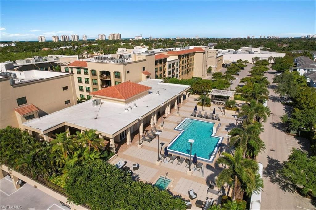 9115 Strada Place, Unit 5512 Naples, FL 34108 - Photo 29 of 42 an aerial view of a house with a lake view